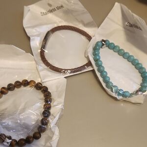 Source Unknown Stainless Steel Bracelets - Brown, Blue, and Gold